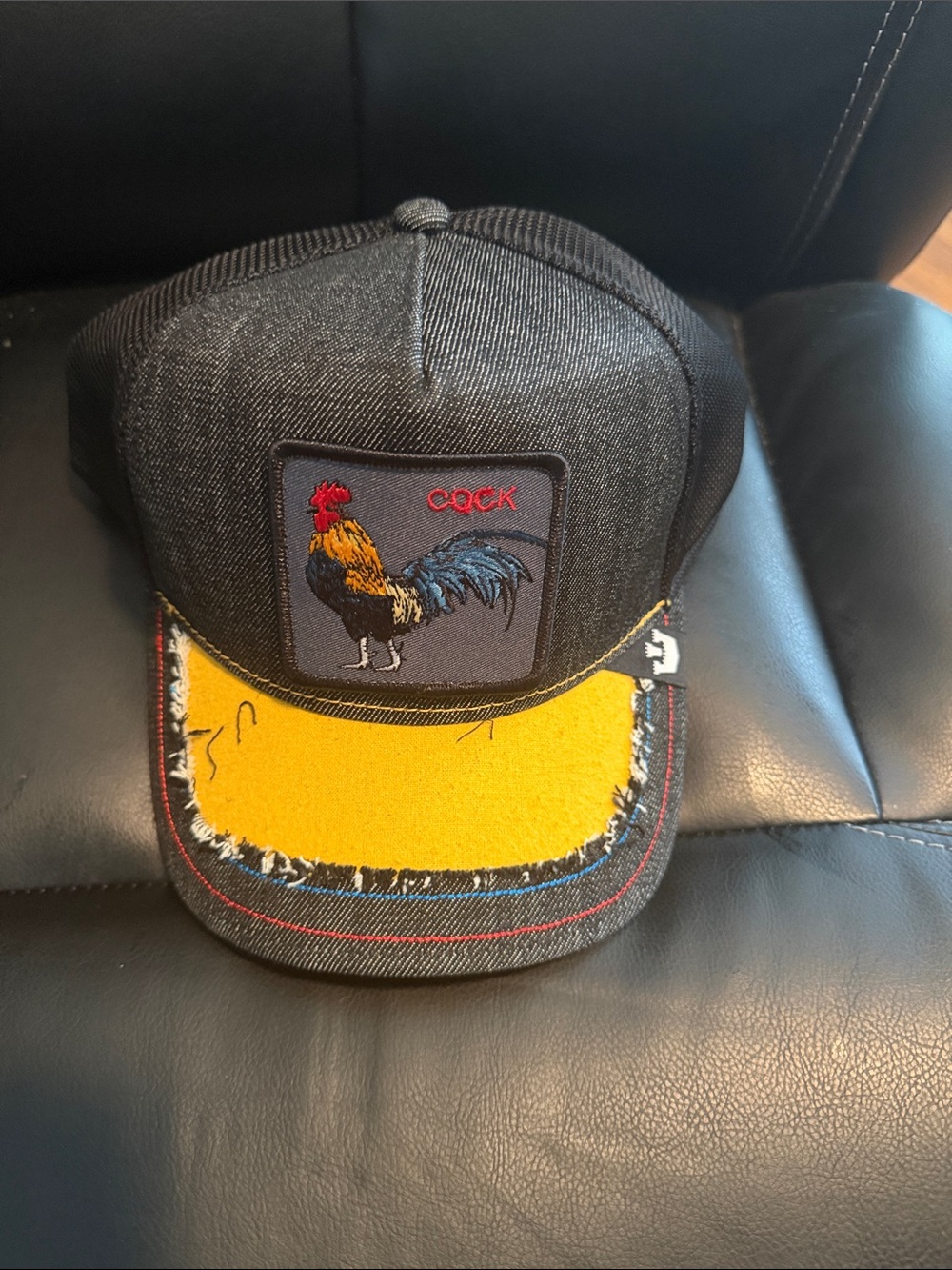Rooster Patch Trucker Cap in Dark Gray with Yellow Brim